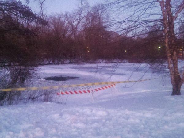 Caution tape marks off a portion of Crystal Lake in Urbana, where Christian Zamora's body was found Friday afternoon.