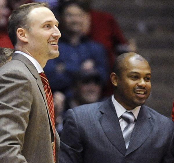 In this Nov. 17, 2013 file photo, Illinois State associate head basketball coach Torrey Ward, right, and head coach Dan Muller smile after a game against Northwestern in Evanston, Ill.