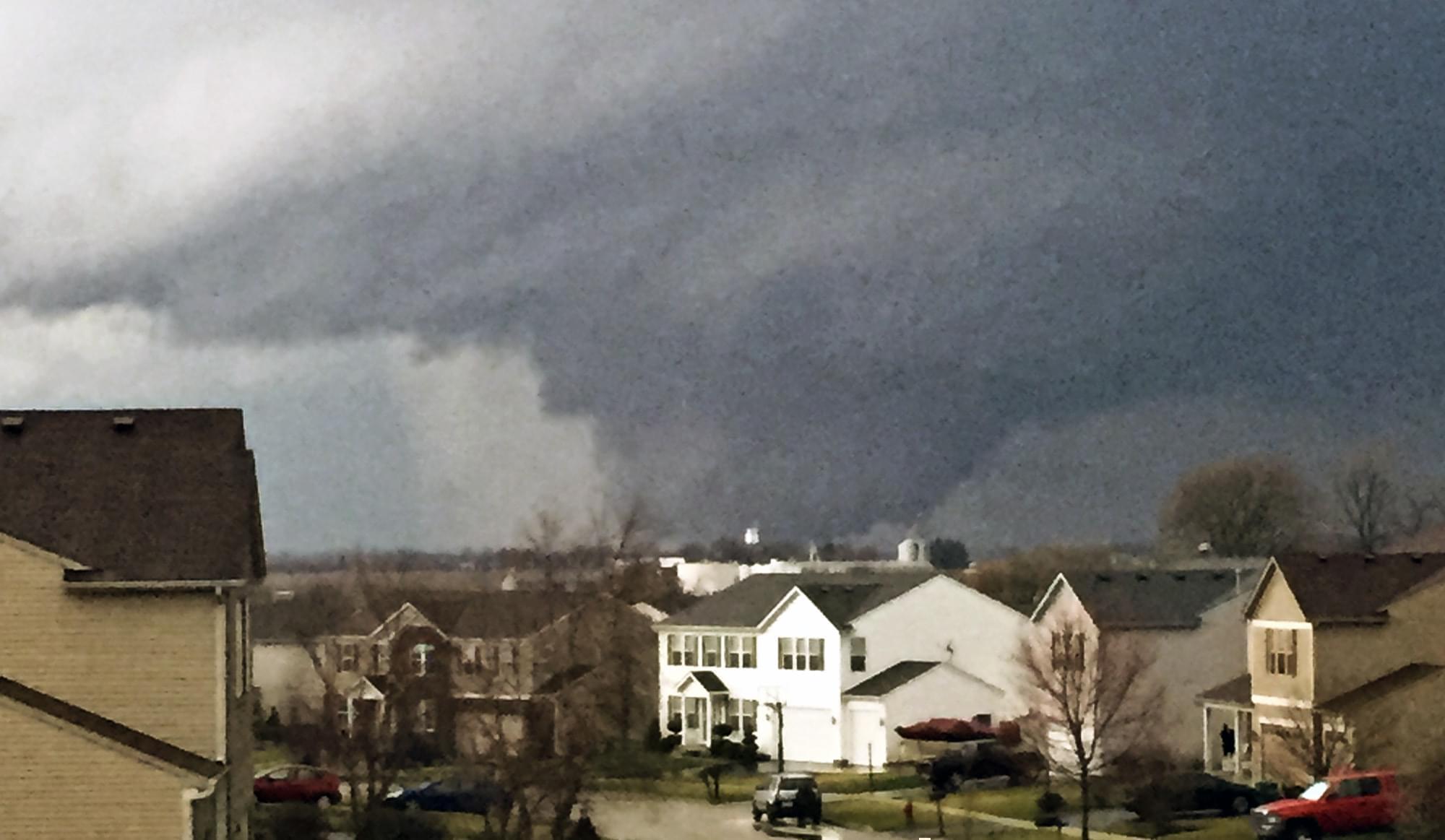 A tornado is viewed near Pearl Street from a home in Kirkland, Ill., on Thursday, April 9, 2015. One person was killed in the tiny community of Fairdale, James Joseph with the Illinois Department of Emergency Management said.