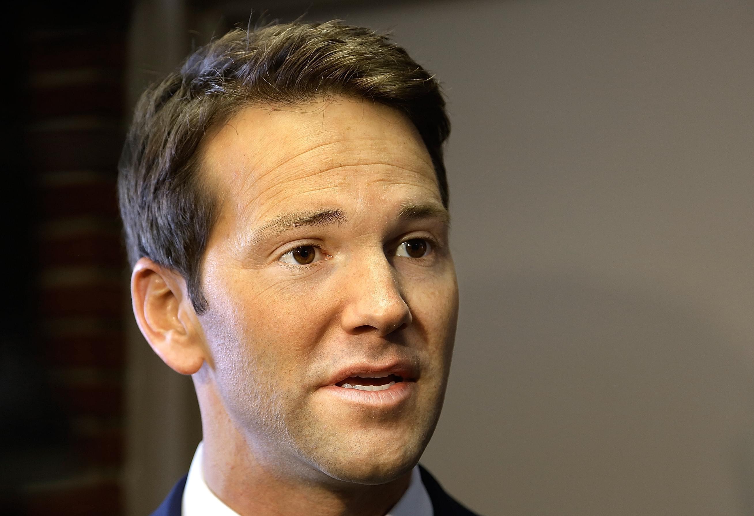 U.S. Rep. Aaron Schock speaks to reporters before meetings with constituents after a week in which he faced twin scandals Friday, Feb. 6