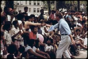 Dan Walker greets Chicago constituents during the Bud Billiken Day Parade, 1973. Photo by John H. White