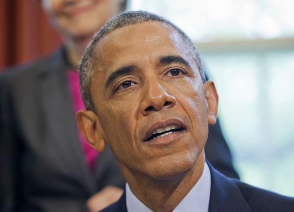 President Barack Obama speaks in the Oval Office of the White House in Washington Thursday.