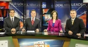 Dave Benton (2nd from left) with WCIA staff in an evening broadcast in 2014, along with sports anchor Aaron Bennett (L), anchor Jennifer Roscoe, and meterologist Derick Fabert.