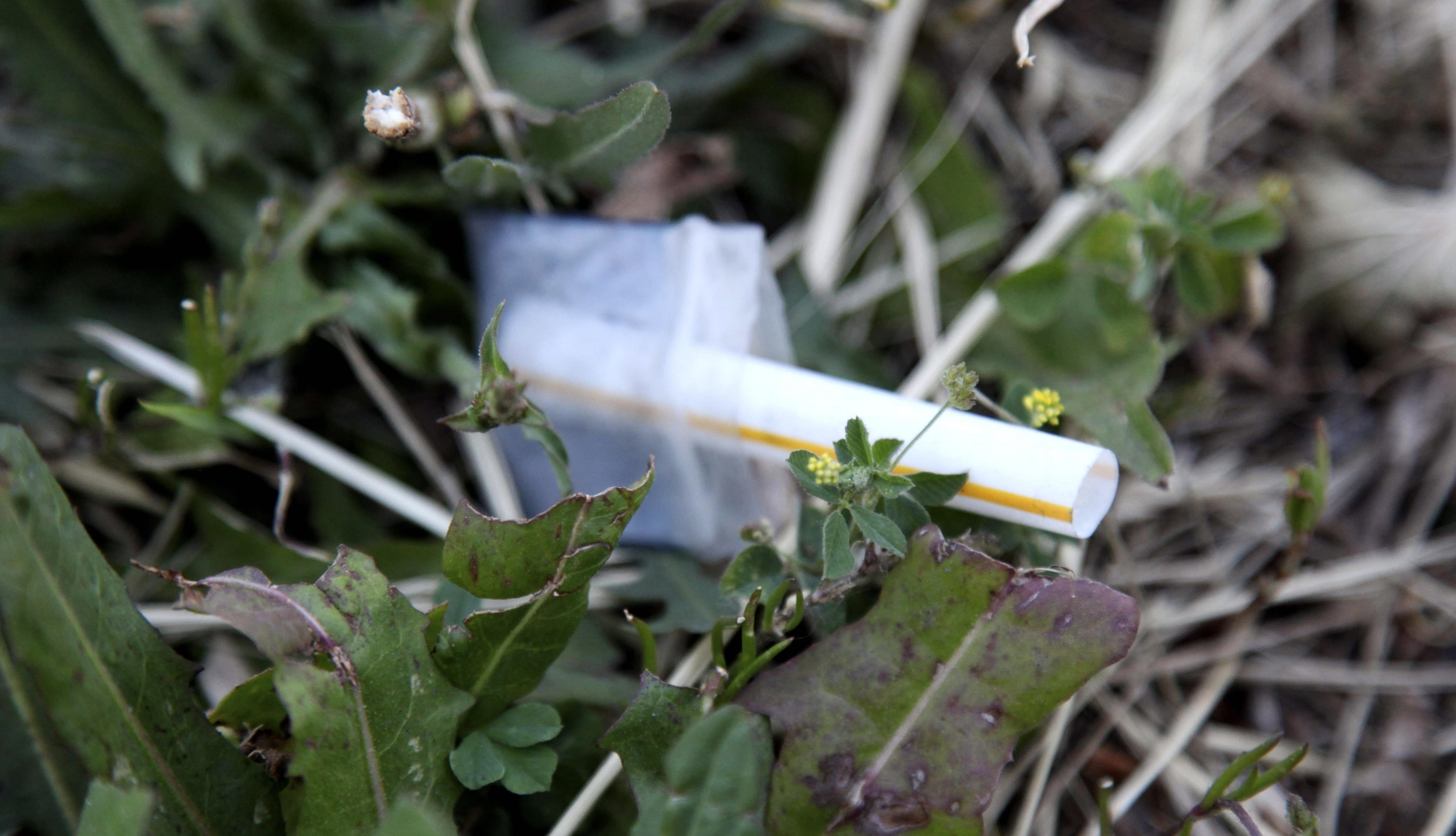 In a June 5, 2012 photo, a heroin pouch lays next to a sidewalk on Chicago's Homan Avenue.