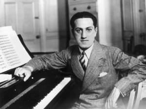 Composer George Gershwin at his piano