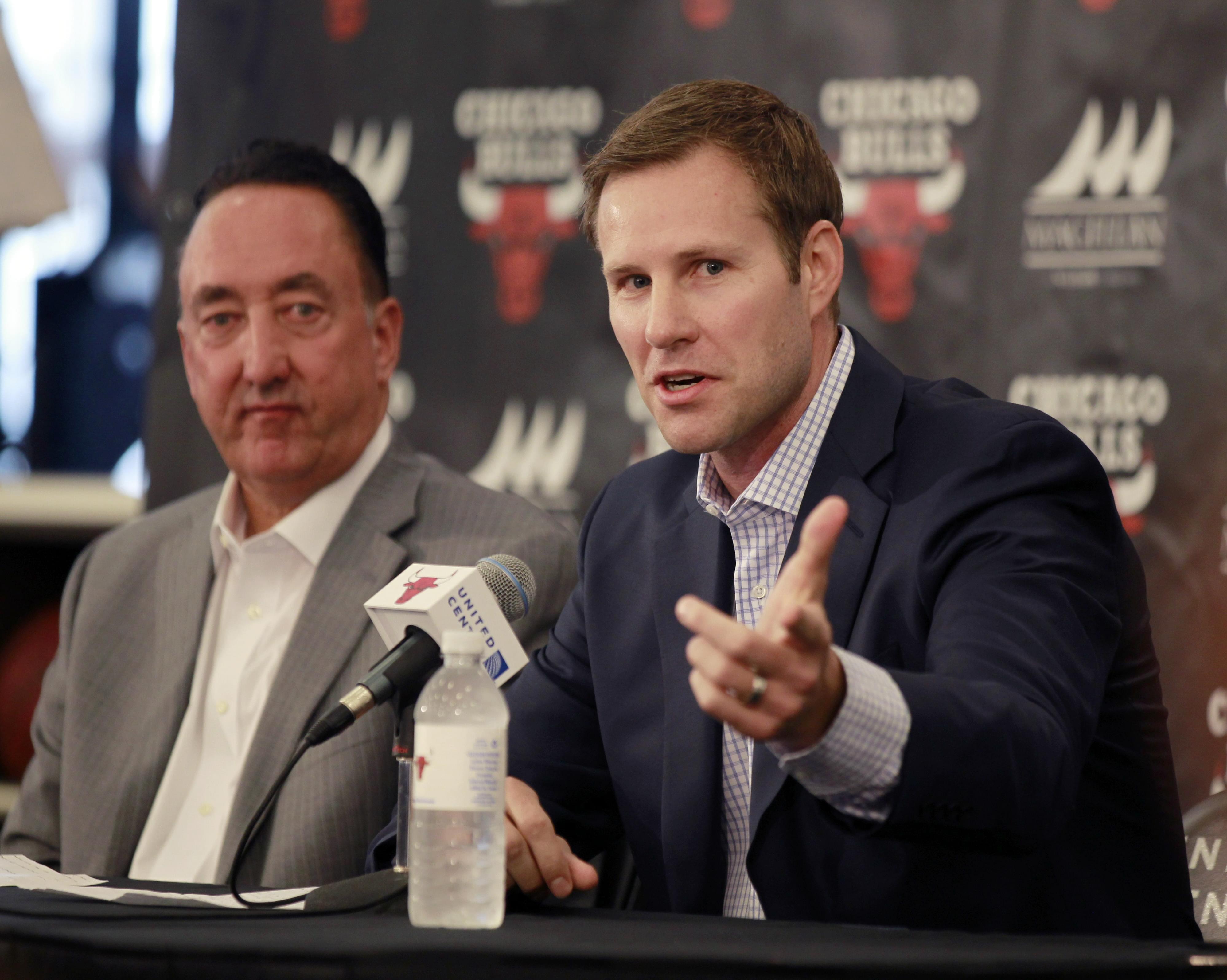 Chicago Bulls new coach Fred Hoiberg, right, speaks as general manager Gar Forman listens during an NBA basketball news conference Tuesday.