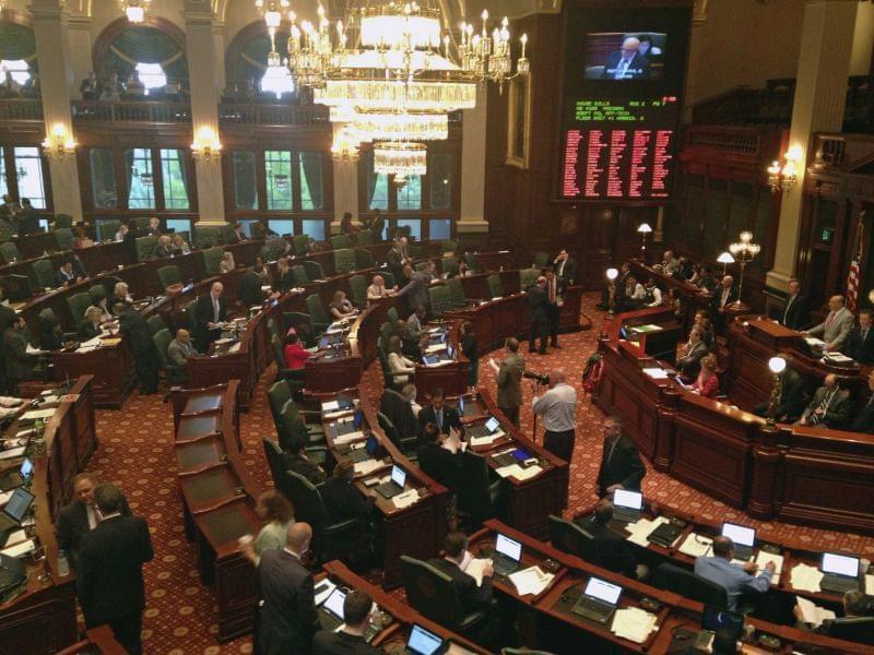 Members of the Illinois assembly meet in the House chambers, at the state Capitol. Pieces of Illinois Democrats&#039; proposed state budget are coming into focus as lawmakers begin advancing them in the Legislature ahead of a scheduled Sunday adj