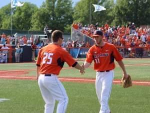 Illini catcher Mark Skonieczny congratulates Tyler Jay after exiting the game in Monday's 4-2 loss to Vanderbilt.
