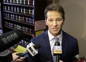 FILE - In this Feb. 6, 2015 file photo, Republican U.S. Rep. Aaron Schock speaks to reporters in Peoria, Ill., before meetings with constituents. A watchdog group has filed a complaint against Schock over his home sale to a campaign donor. According 