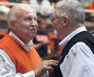 In this Jan. 18, 2014, file photo, former Illinois coach Lou Henson, left, chats with Rod Cardinal during Illinois' loss to Michigan State.