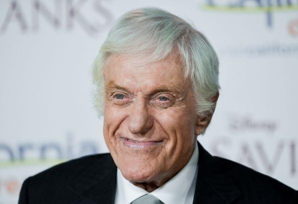 In this Dec. 9, 2013 file photo, Dick Van Dyke arrives at the U.S. premiere of "Saving Mr. Banks" at Disney Studios in Burbank, Calif. Van Dyke's childhood home could be torn down after the city condemned the dilapidated building in Da