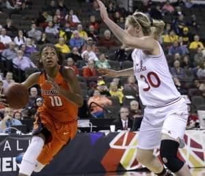 In this March 5, 2015, file photo, Illinois' Amarah Coleman drives to the basket as Nebraska's Chandler Smith guards during a game in Hoffman Estates, Ill. Coleman is one of seven former University of Illinois women's basketball player