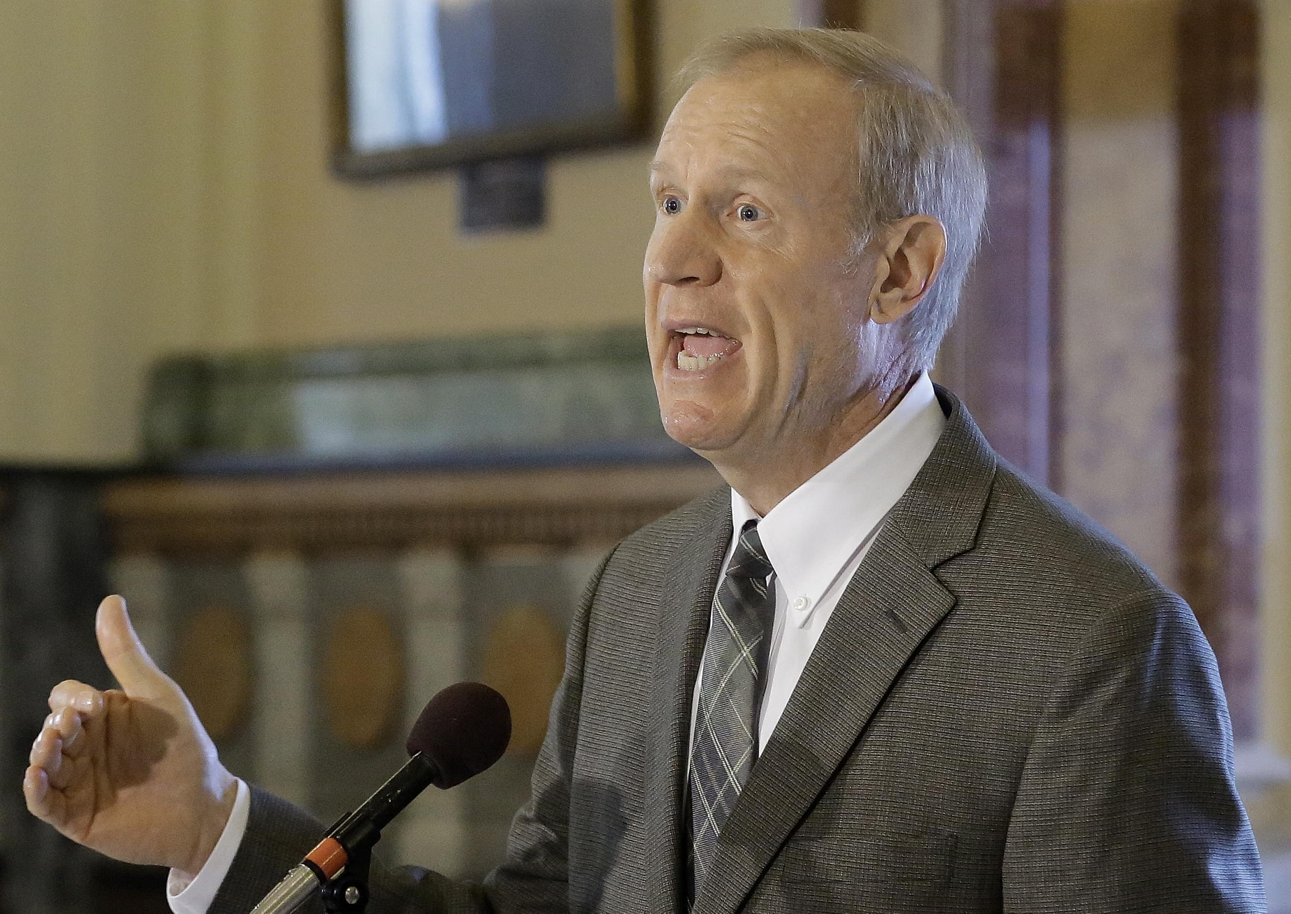 In this July 21, 2015, file photo, Illinois Gov. Bruce Rauner speaks in Springfield. 