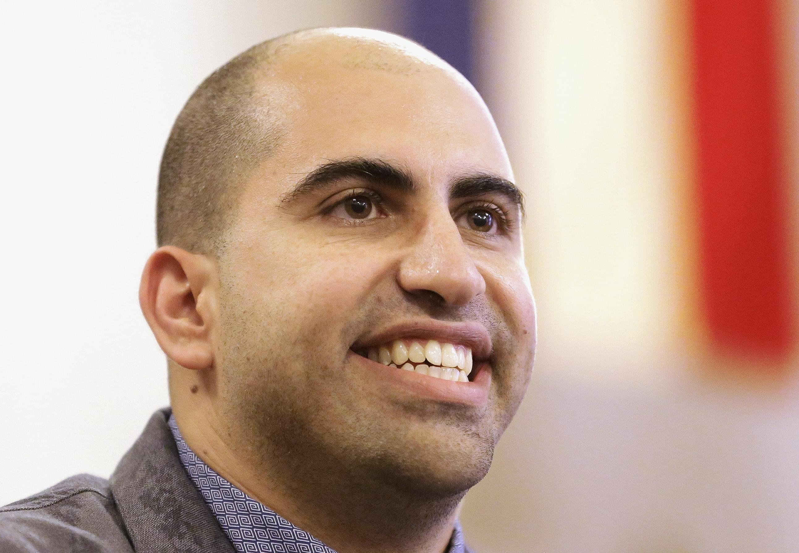 In this Sept. 9, 2014 file photo, Steven Salaita, speaks to students and reporters during a news conference at the University of Illinois YMCA.
