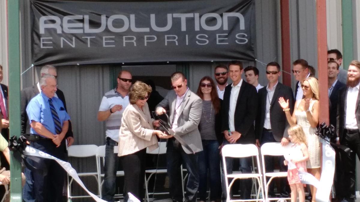Revolution Enterprise CEO Tim McGraw and Delavan, Illinois Mayor Liz Skinner cut the ribbon at the new medical marijuana cultivation center in Delavan, in late July, 2015.