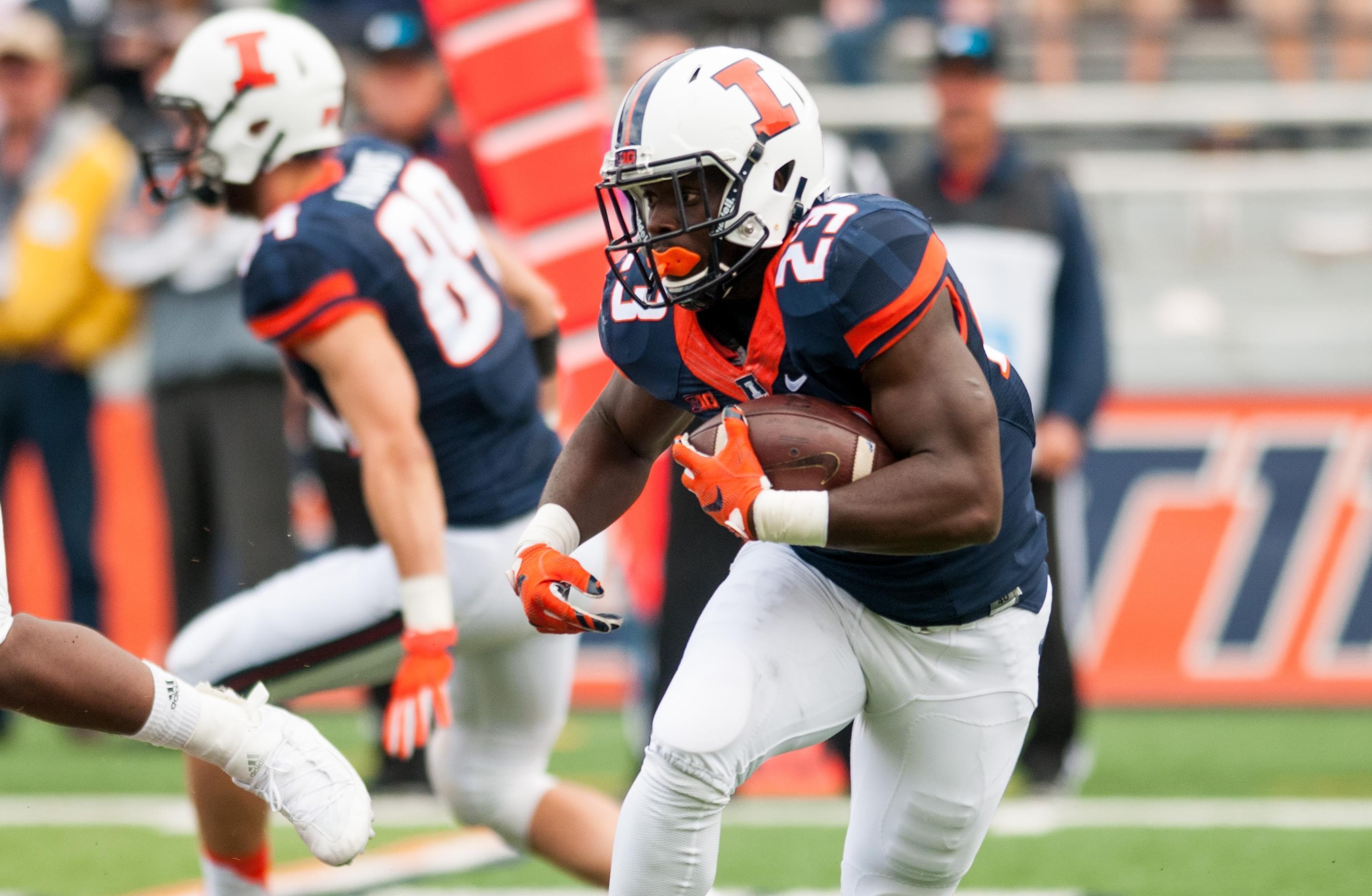 Illinois running back Henry Enyenihi (23) runs the ball during the fourth quarter against Western Illinois Saturday, Sept. 12, 2015, at Memorial Stadium in Champaign. Illinois won 44-0.