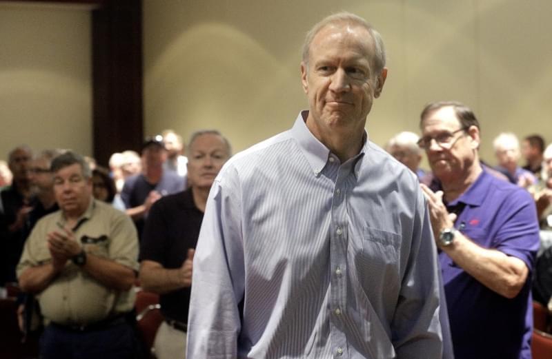 Illinois Gov. Bruce Rauner is applauded before while speaking to members of the Illinois Emergency Management Agency Friday, Sept. 11, 2015 in Springfield.
