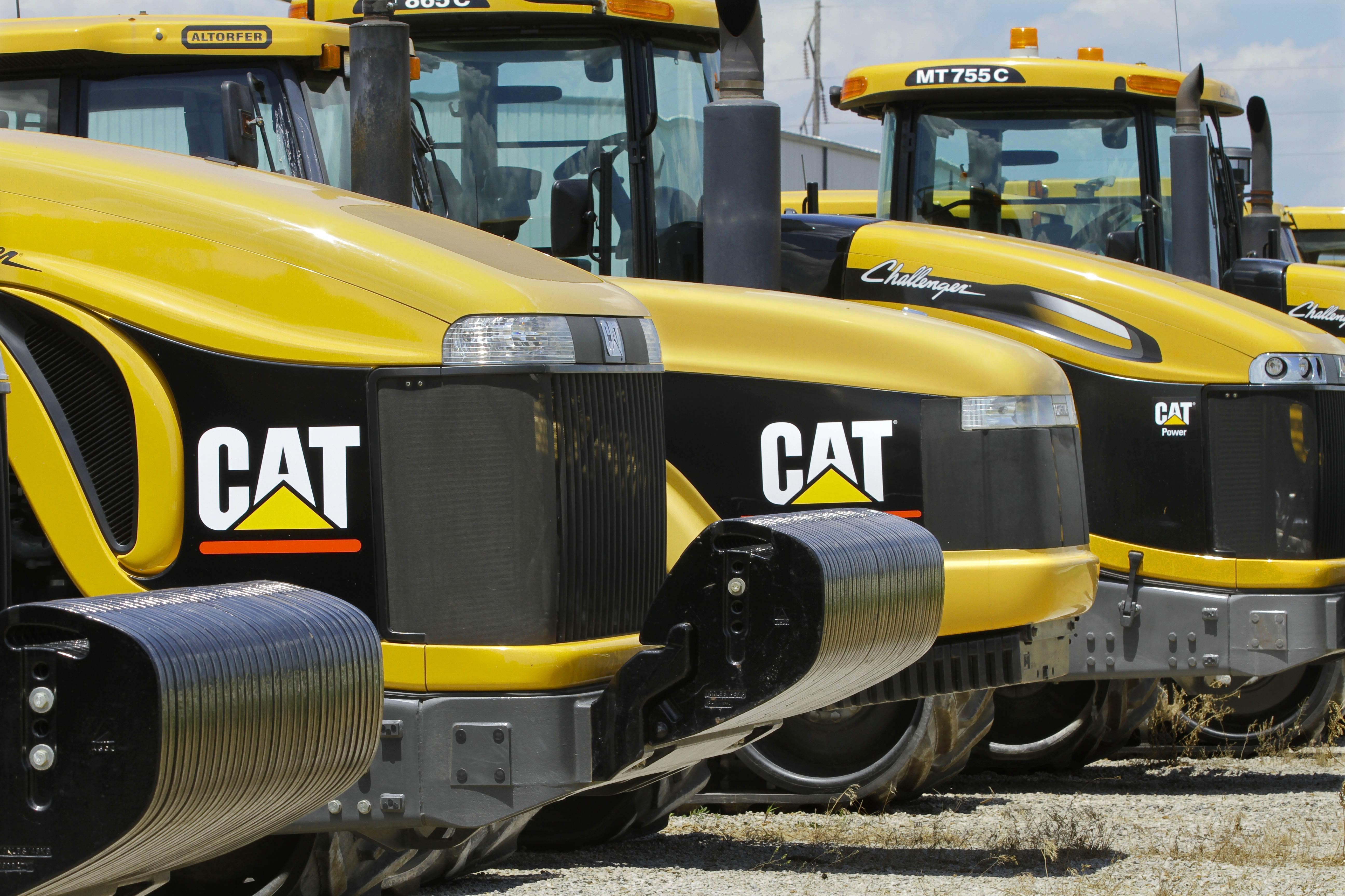 this June 20, 2012 file photo, earth-moving tractors and equipment made by Peoria, Ill.-based Caterpillar Inc. are seen in Clinton, Ill.