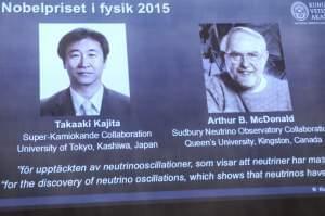 A screen shows the winners as members of the Nobel Assembly announce the winner of the 2015 Nobel Prize in physics, in Stockholm Tuesday 