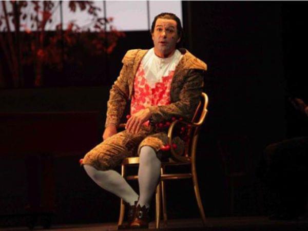 Nathan Gunn on stage as Figaro in The Barber of Seville