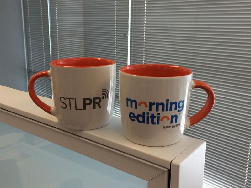 A ceramic mug with the St. Louis Public Radio and Morning Edition logos.