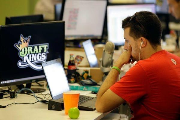 A man works on Draft King the fantacy sports website
