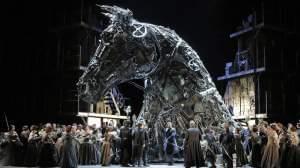 Large trojan horse on stage with full cast