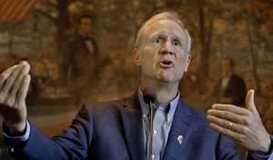 In this Oct. 16, 2015 file photo, Illinois Gov. Bruce Rauner speaks to reporters about the Illinois budget at the State Capitol in Springfield.