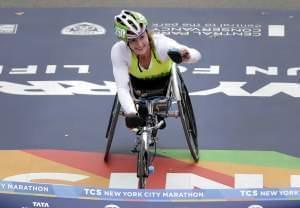 Tatyana McFadden crosses the finish line to win the women's wheelchair division of the New York City Marathon