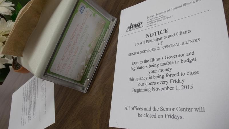 A notice at Senior Services of Central Illinois warns clients that it can no longer open on Fridays because of Illinois' partial government shutdown.