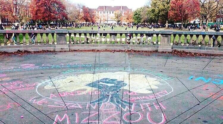 A drawing of #UIUCstandsWithMizzou near the steps of Foellinger.