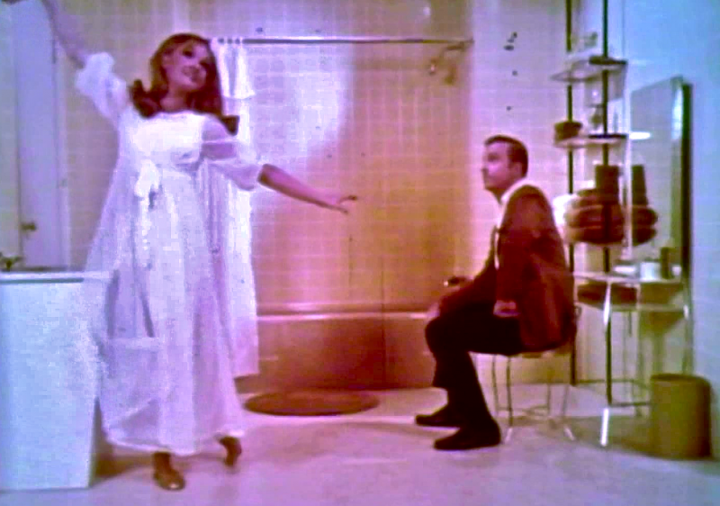 Still picture from "The Bathrooms are Coming", the 1969 American-Standard Musical.