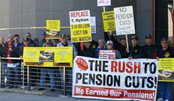 Opponents of the pension rescue plan demonstrate outside a meeting of pension fund officials.