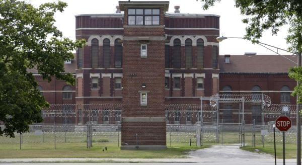 In this Aug. 20, 2008 file photo, guard tower No. 7 stands between South House to the left, and North House to the right and the cafeteria in the center of the Pontiac Correctional Center in Pontiac, Ill. 