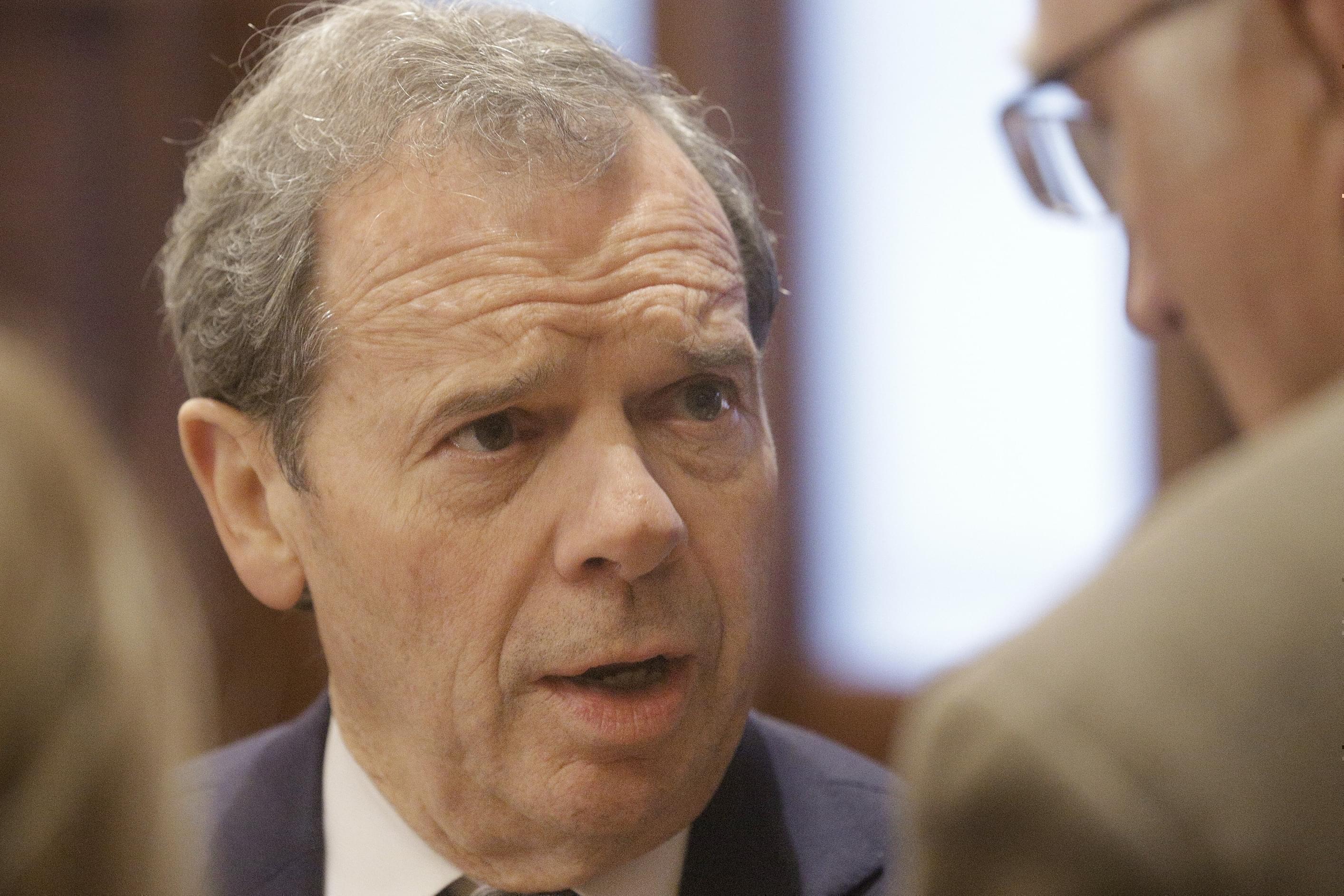 Illinois Senate President John Cullerton, D-Chicago, speaks to reporters while on the Senate floor during session at the Illinois State Capitol Monday, Dec. 7, 2015, in Springfield