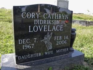 This Wednesday, Sept. 24, 2014 photo shows the headstone marking the final resting place of Cory Lovelace at Woodland Cemetery in Quincy, Ill.