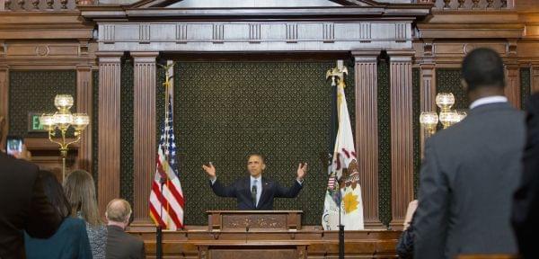 President Barack Obama receives a standing ovation before addressing the Illinois General Assembly in Springfield.