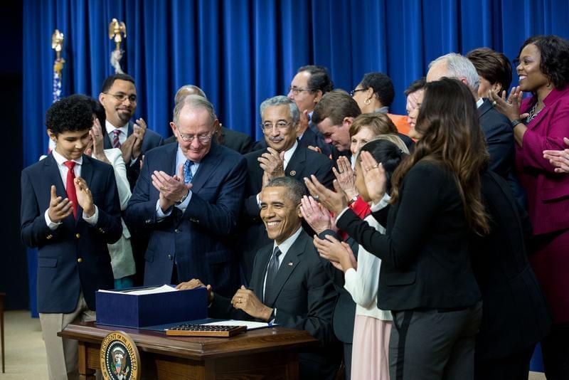 President Barack Obama signs the Every Student Succeed Act in December 2015