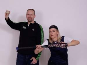 Brian Moline and Lisa Bralts posing for a sports action photo.