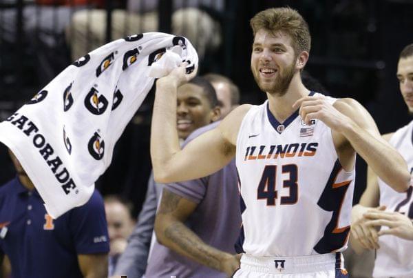 Illinois' Michael Finke (43) reacts on the bench in the second half of an NCAA college basketball game against Minnesota at the Big Ten Conference tournament, Wednesday, March 9, 2016, in Indianapolis. Illinois won 85-52.