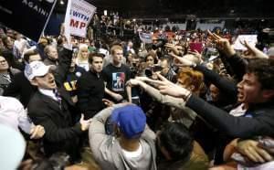 upporters of Republican presidential candidate Donald Trump, left, face off with protesters after a rally on the campus of the University of Illinois-Chicago was cancelled due to security concerns Friday,