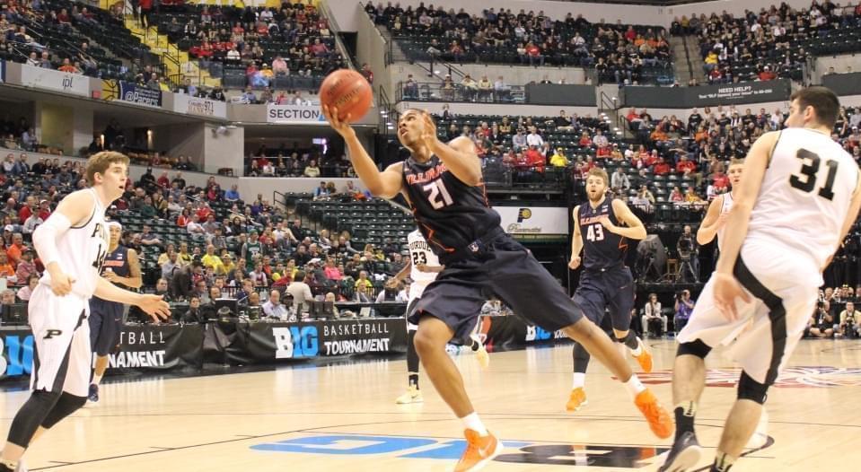 Malcolm Hill launches a shot against Purdue.