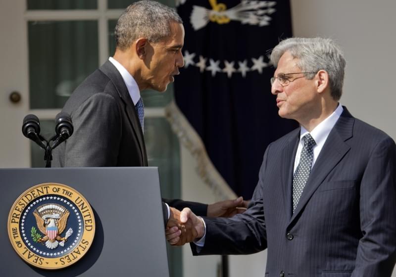 Federal appeals court judge Merrick Garland, right, shakes hands with President Barack Obama as he is introduced as Obama's nominee for the Supreme Court during an announcement in the Rose Garden of the White House, in Washington, Wednesday, Mar