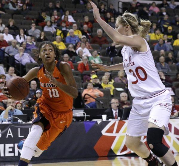 In this March 5, 2015, file photo, Illinois' Amarah Coleman, left, drives to the basket as Nebraska's Chandler Smith guards during an NCAA college basketball game in Hoffman Estates, Ill