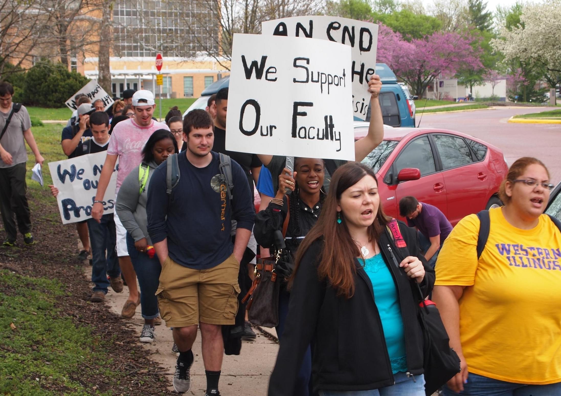 Students demonstrate for higher education funding on the campus of Western Illinois University in Macomb. 
