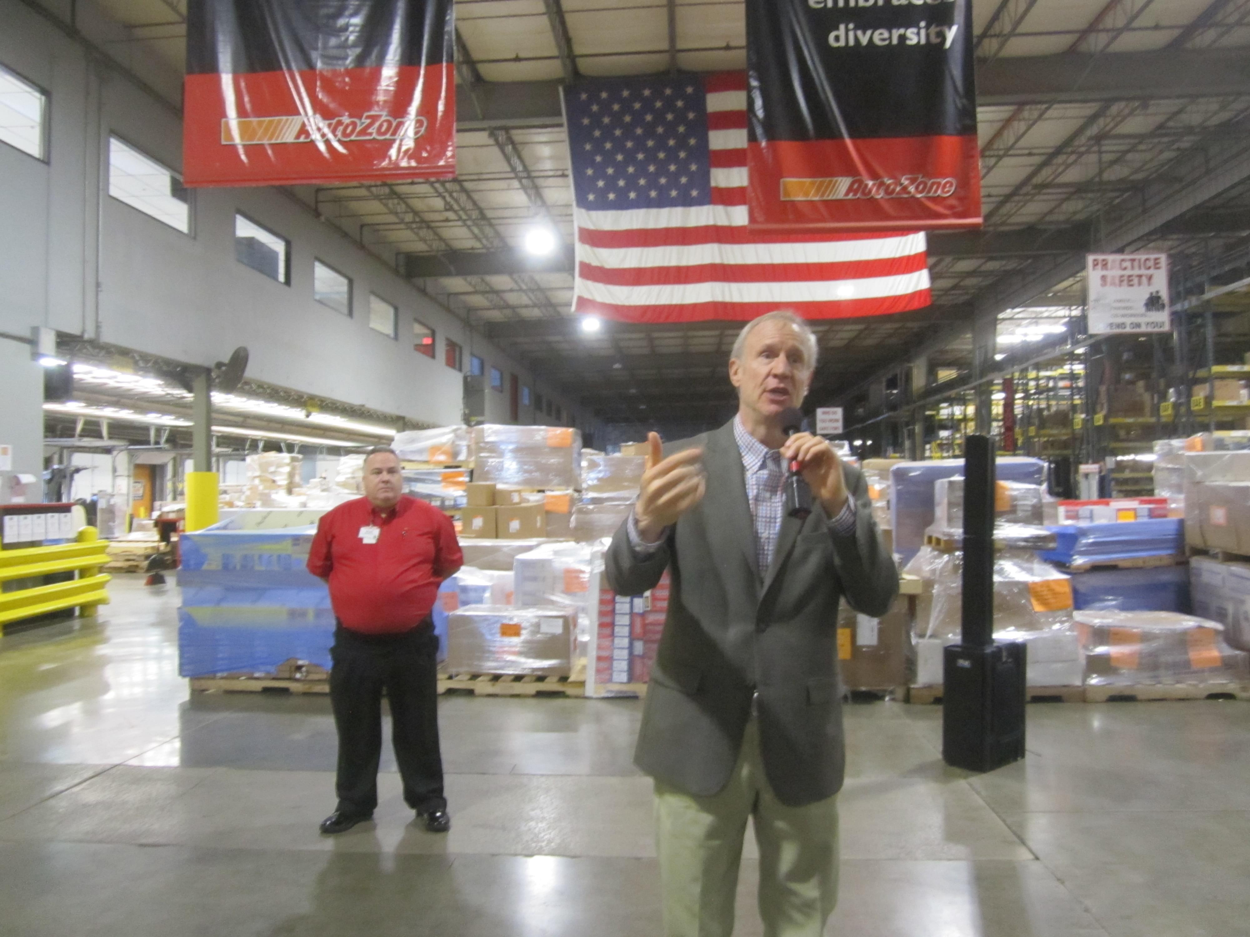 Gov. Bruce Rauner in a visit to an AutoZone distribution facility in Danville March 29. 