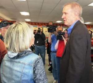 Governor Rauner greets supporters at Nord's Outdoor Power in Bloomington