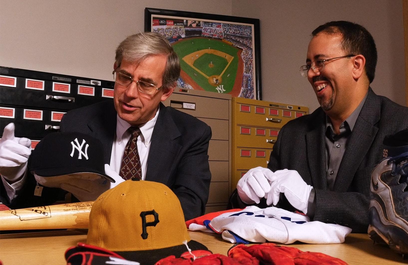 U of I History Professor Adrian Burgos with National Baseball Hall of Fame Curator John Odell