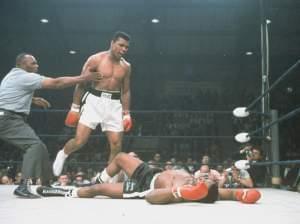 Muhammed Ali stands over Sonny Liston after knocking him out in 1965.