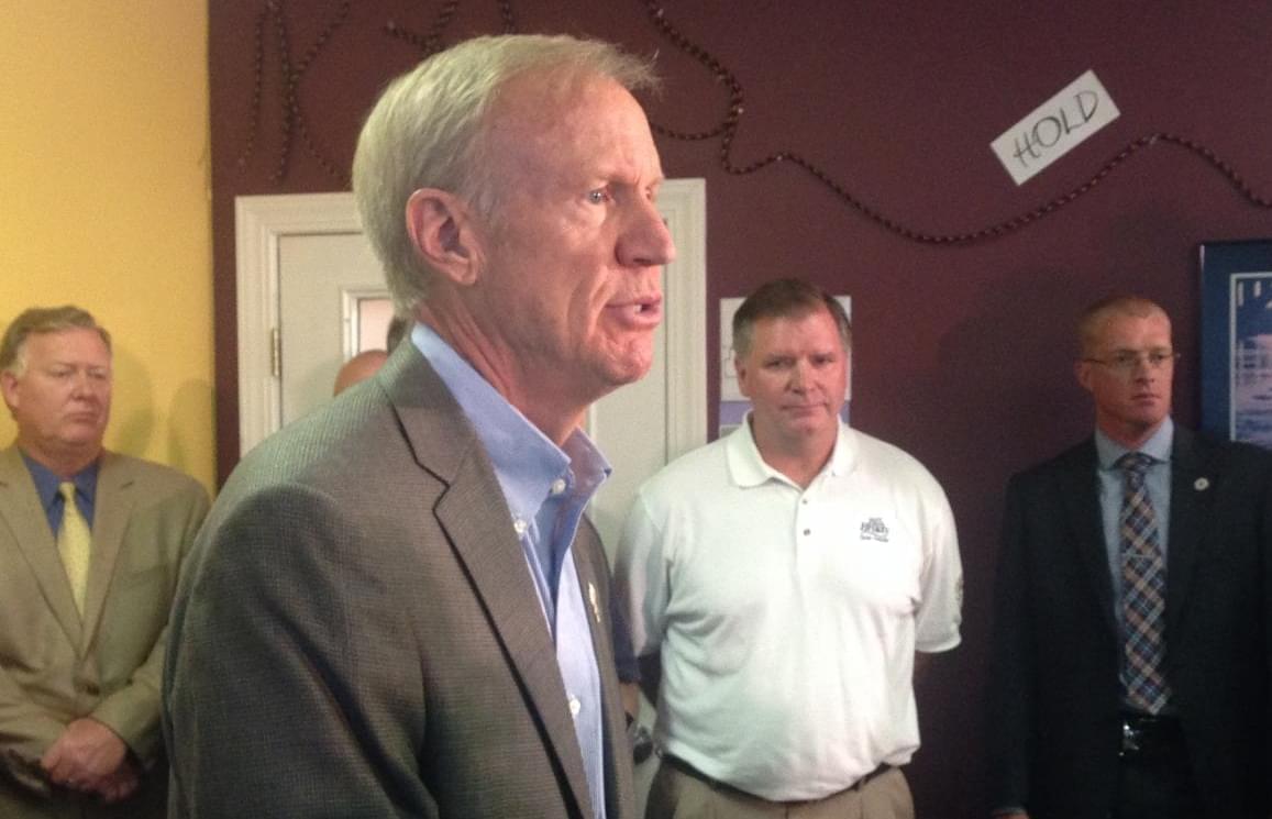 Illinois Governor Bruce Rauner speakin to school superintendents in Bloomington.